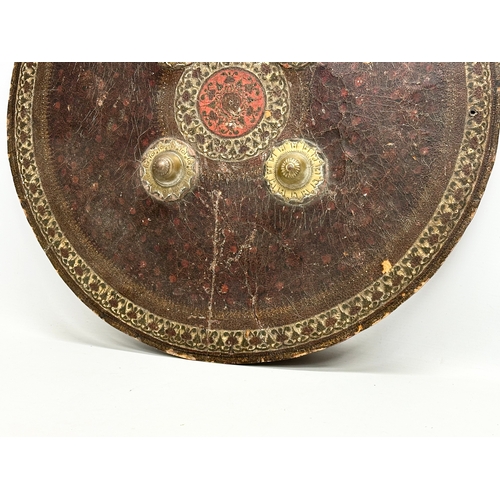 6 - An Early 19th Century Indian rhino hide Dhal shield. Late Maratha Empire (1674-1818) 51cm.