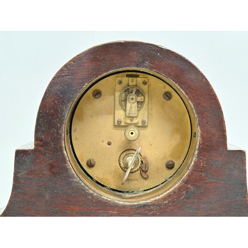 522 - An Edwardian period mahogany cased mantle clock. French movement. 34x11x25cm