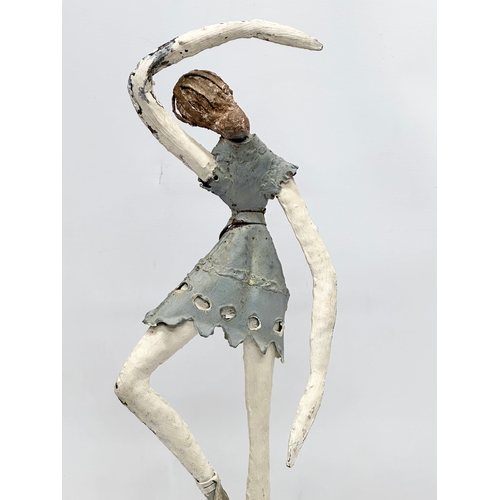 176 - Ed Hart. A large “Dancer” sculpture. Signed E. Hart, NY. 54cm