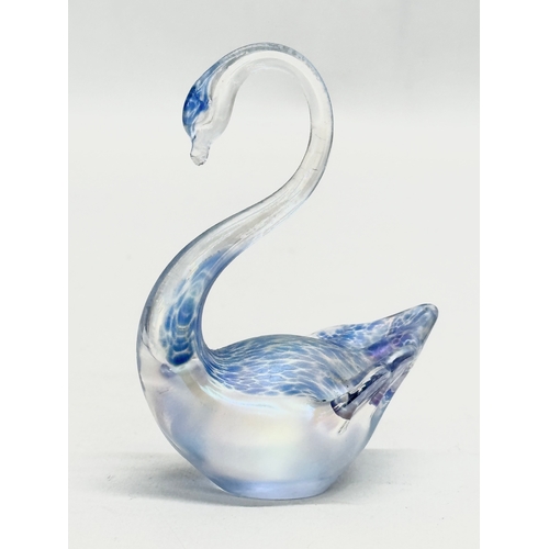 715 - 2 iridescent art glass swans by Heron Glass. 1990’s. 14cm. 8cm.  (1)