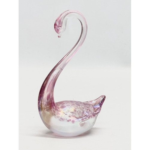 715 - 2 iridescent art glass swans by Heron Glass. 1990’s. 14cm. 8cm.  (1)