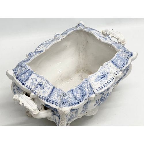 429 - Seasons New Stone China. A large Early 19th Century English blue and white tureen with cover. 36x24x... 