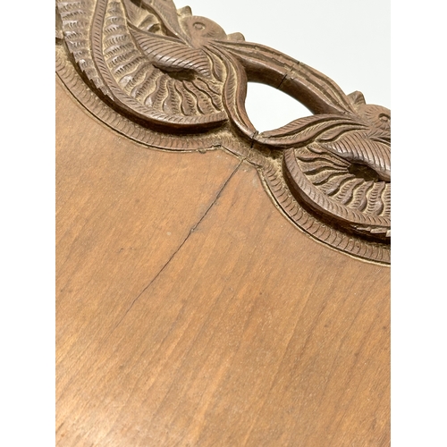 523 - An Early 20th Century Chinese carved teak tray. 59x36cm