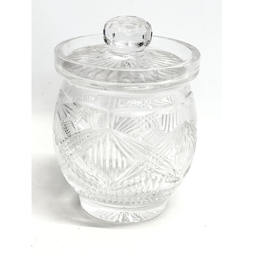 714 - A quantity of Irish crystal. A Waterford desktop paperweight penholder. A Tyrone Crystal table lamp,... 