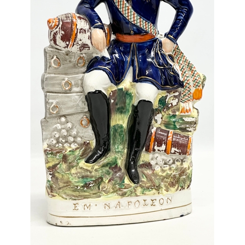 198 - A large Mid/Late 19th Century Staffordshire Pottery “EM Napoleon III” figure. 41cm