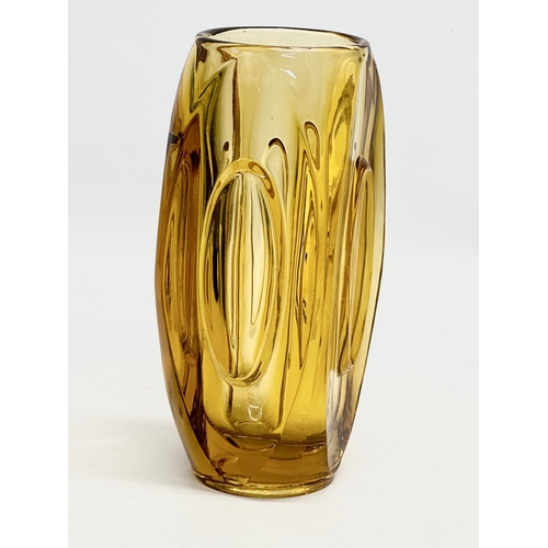 327 - Rudolf Schrotter. A Mid 20th Century Czech amber glass “Lens” vase. Designed by Rudolf Schrotter for... 