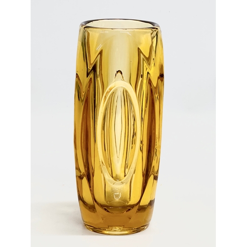 327 - Rudolf Schrotter. A Mid 20th Century Czech amber glass “Lens” vase. Designed by Rudolf Schrotter for... 