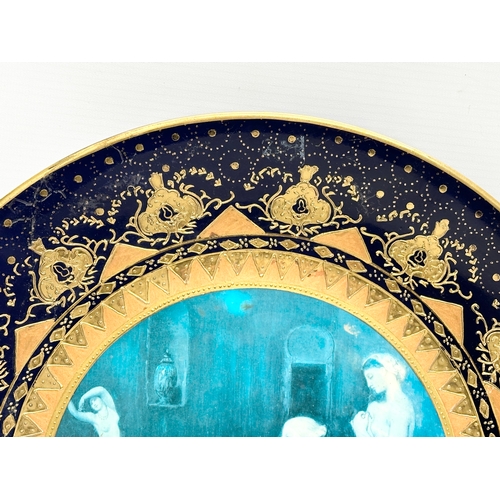 352C - A pair of Sevres Louis-Philippe style French gilt and cobalt blue cabinet plates. 35cm