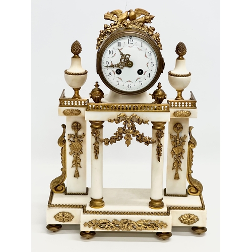 56 - A good quality Late 19th Century French onyx and gilt brass 3 piece clock set. With enamelled dial f... 