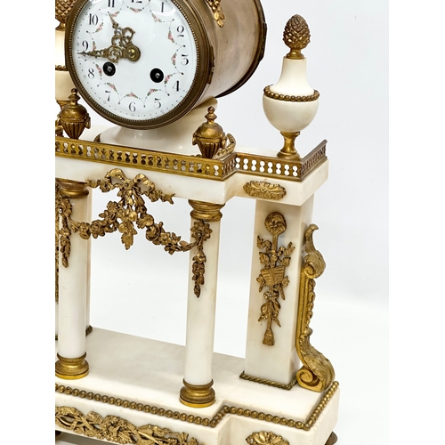 56 - A good quality Late 19th Century French onyx and gilt brass 3 piece clock set. With enamelled dial f... 