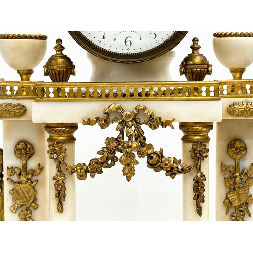 56 - A good quality Late 19th Century French onyx and gilt brass 3 piece clock set. With enamelled dial f... 