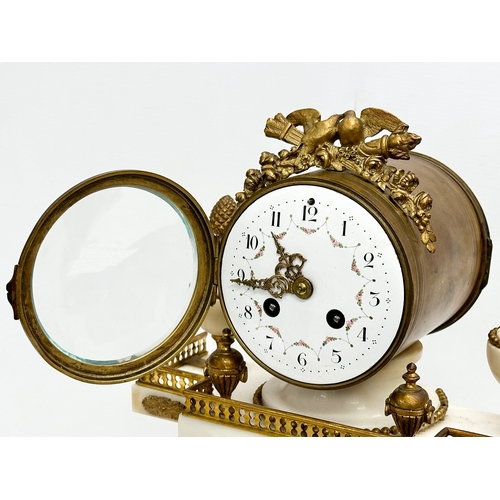 56 - A good quality Late 19th Century French onyx and gilt brass 3 piece clock set. With enamelled dial f... 