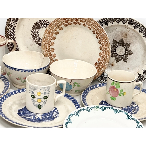 433 - A collection of 19th Century spongeware and pearlware pottery. Drinking mugs and tankards, dinner pl... 