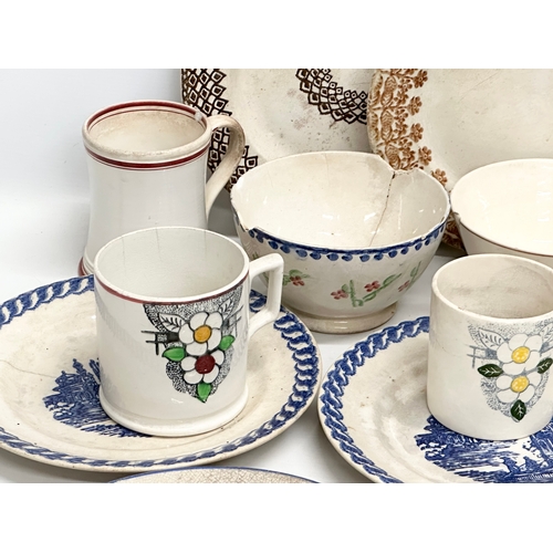 433 - A collection of 19th Century spongeware and pearlware pottery. Drinking mugs and tankards, dinner pl... 