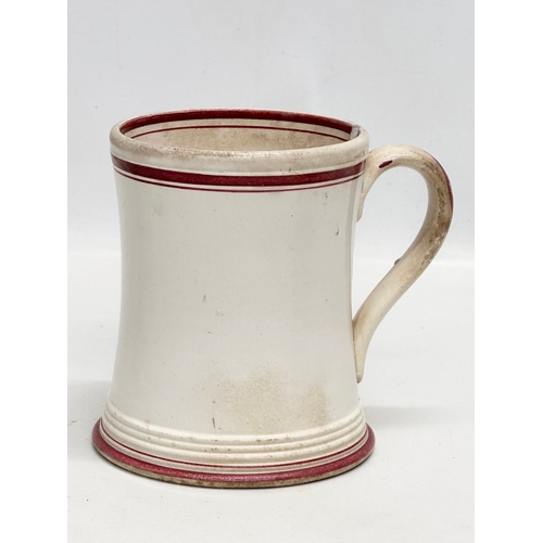 433 - A collection of 19th Century spongeware and pearlware pottery. Drinking mugs and tankards, dinner pl... 