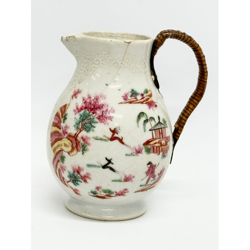 73 - A Late 18th Century Chinese Export cream jug, with woven handle. Circa 1770-1790. 9x10cm.   (8)