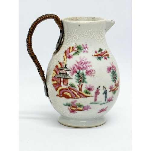 73 - A Late 18th Century Chinese Export cream jug, with woven handle. Circa 1770-1790. 9x10cm.   (8)