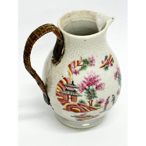 73 - A Late 18th Century Chinese Export cream jug, with woven handle. Circa 1770-1790. 9x10cm.   (8)