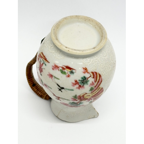 73 - A Late 18th Century Chinese Export cream jug, with woven handle. Circa 1770-1790. 9x10cm.   (8)