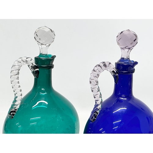 58 - A Pair of Late 19th Century Victorian Bristol Blue and Green Glass Flagon Decanters. With twist rope... 