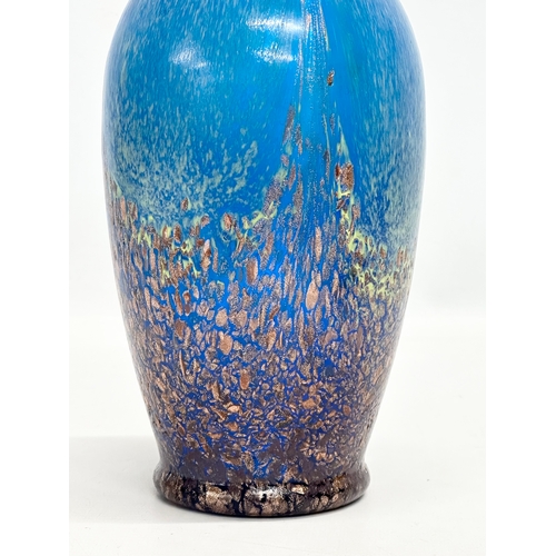 137 - Dale Tiffany. A Late 20th Century speckled art art glass vase. 26cm