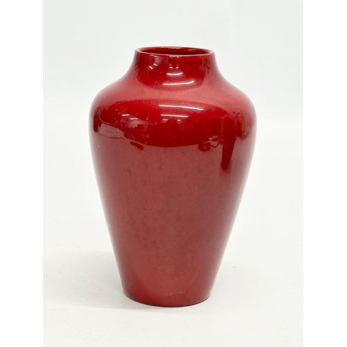 251 - 2 Royal Doulton “Flambe” vases. 15cm. 11cm.