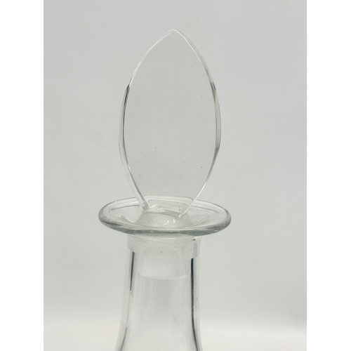 210 - An Early 19th Century etched glass decanter. 1800-1820. 31cm.