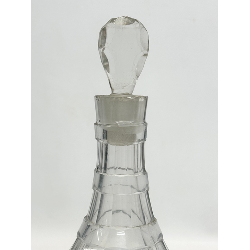 211 - An Early 19th Century Irish Late Georgian slice cut decanter. Circa 1810-1830. 29cm