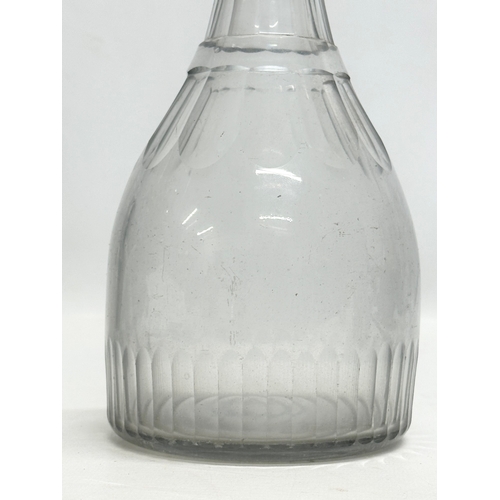 211 - An Early 19th Century Irish Late Georgian slice cut decanter. Circa 1810-1830. 29cm