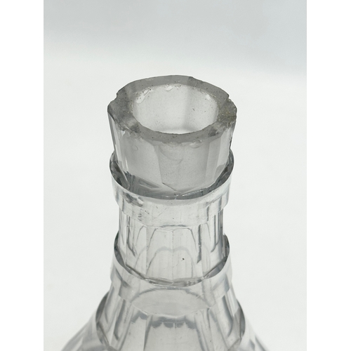 211 - An Early 19th Century Irish Late Georgian slice cut decanter. Circa 1810-1830. 29cm