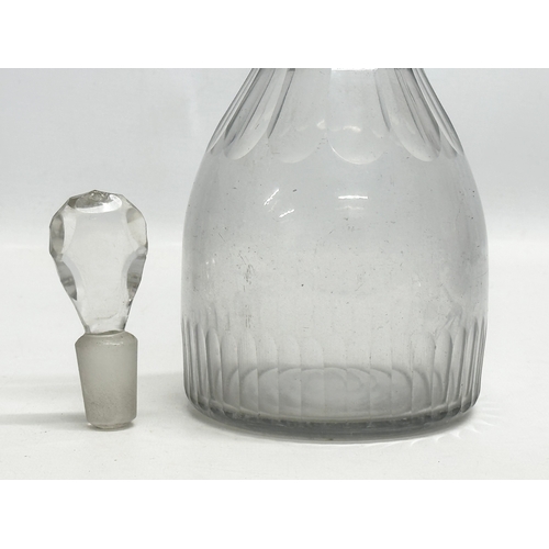 211 - An Early 19th Century Irish Late Georgian slice cut decanter. Circa 1810-1830. 29cm