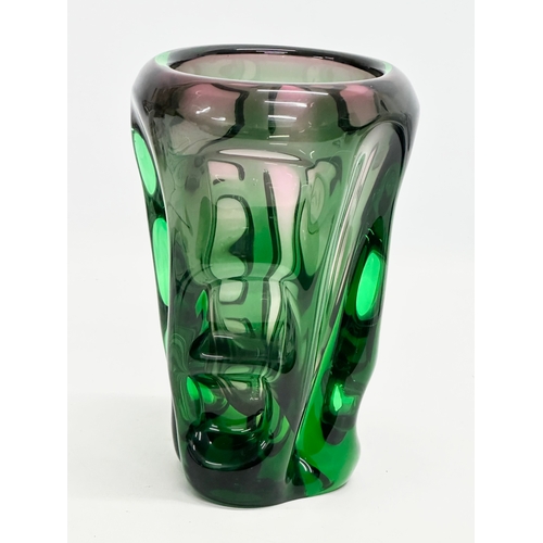 63 - Bohuslav Beranek. A Mid 20th Century Czech emerald green glass vase. 13.5x20.5cm