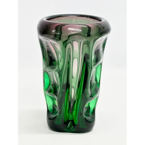 63 - Bohuslav Beranek. A Mid 20th Century Czech emerald green glass vase. 13.5x20.5cm