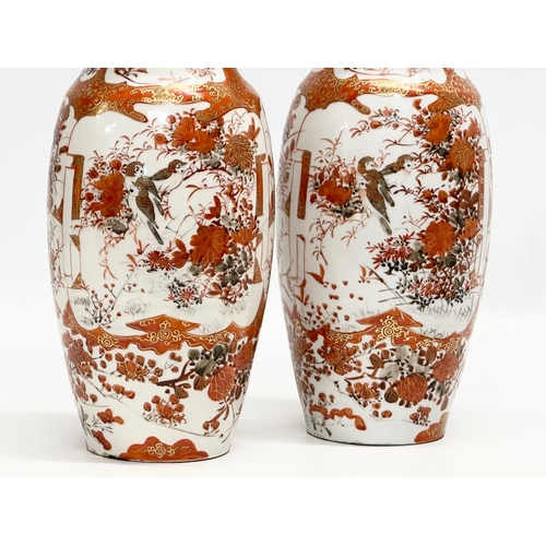 79 - A pair of signed Late 19th/Early 20th Century Japanese hand painted baluster vases. Kutani. Meiji Pe... 