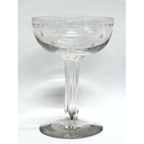 155 - A set of 4 Late 19th Century etched champagne glasses. Circa 1860-1880. 9x12.5cm