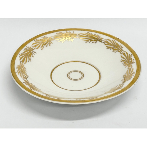 10 - KPM Berlin. An Early 19th Century gilt porcelain cup and saucer. Dein Gluck Mein Wunsch.