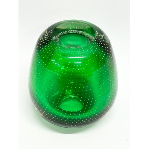 64 - Andries Dirk Copier. A 20th Century Leerdam Glasfabriek emerald green vase, with controlled bubble d... 