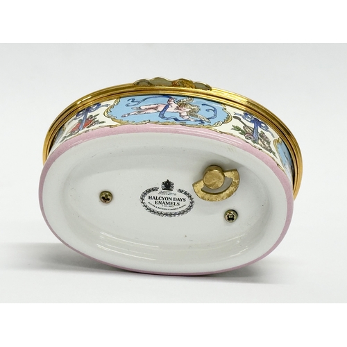 535 - A Halcyon Days Enamels cherub musical trinket box with case.  (1)