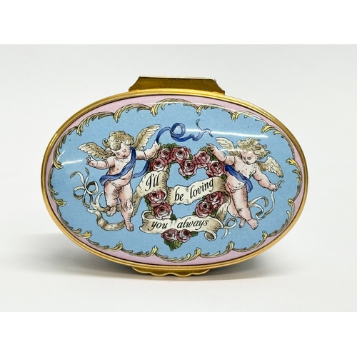 535 - A Halcyon Days Enamels cherub musical trinket box with case.  (1)