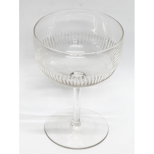 161 - A set of 4 Edwardian slice cut champagne glasses. 8x11.5cm