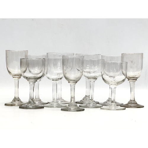 163 - 11 19th Century Victorian port glasses. Circa 1860-1870. 6x11.5cm. 5x12cm.