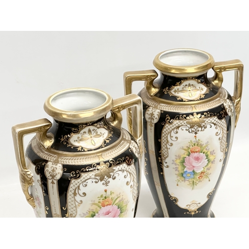 234 - A pair of large Early 20th Century Japanese hand painted urn style vases. By Noritake. 20x17x31cm.