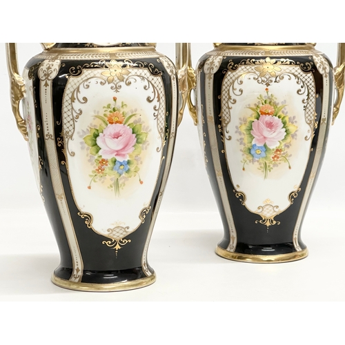 234 - A pair of large Early 20th Century Japanese hand painted urn style vases. By Noritake. 20x17x31cm.