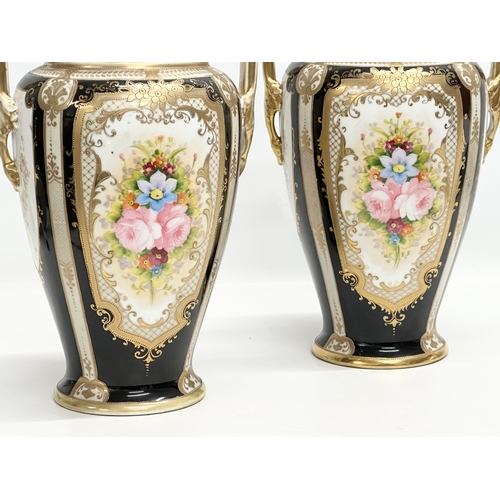 234 - A pair of large Early 20th Century Japanese hand painted urn style vases. By Noritake. 20x17x31cm.