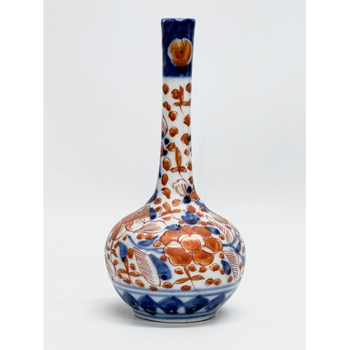 245 - 4 Late 19th Century Japanese Imari bottle vases. Meiji Period (1868-1912) 15.5cm. 14.5cm. 10cm. 9cm.