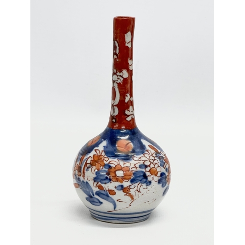 245 - 4 Late 19th Century Japanese Imari bottle vases. Meiji Period (1868-1912) 15.5cm. 14.5cm. 10cm. 9cm.