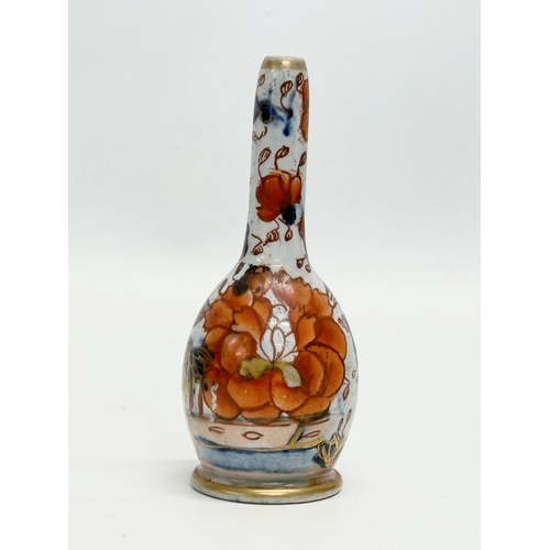 245 - 4 Late 19th Century Japanese Imari bottle vases. Meiji Period (1868-1912) 15.5cm. 14.5cm. 10cm. 9cm.