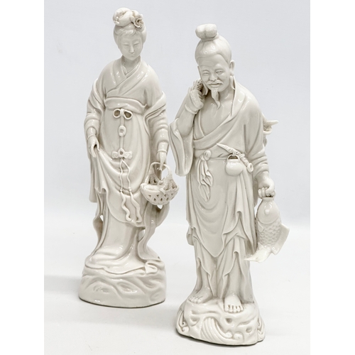 254 - A pair of Early/Mid 20th Century Chinese Blanc De Chine figurines. 25cm