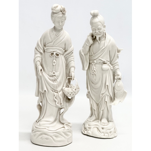 254 - A pair of Early/Mid 20th Century Chinese Blanc De Chine figurines. 25cm