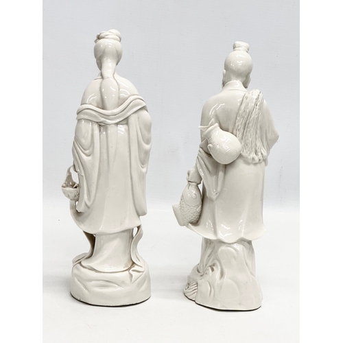 254 - A pair of Early/Mid 20th Century Chinese Blanc De Chine figurines. 25cm